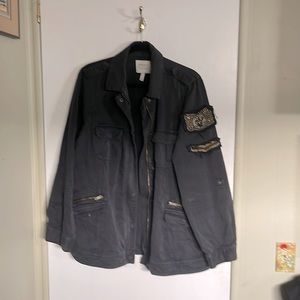 Military style jacket. It has a little stretch to it.